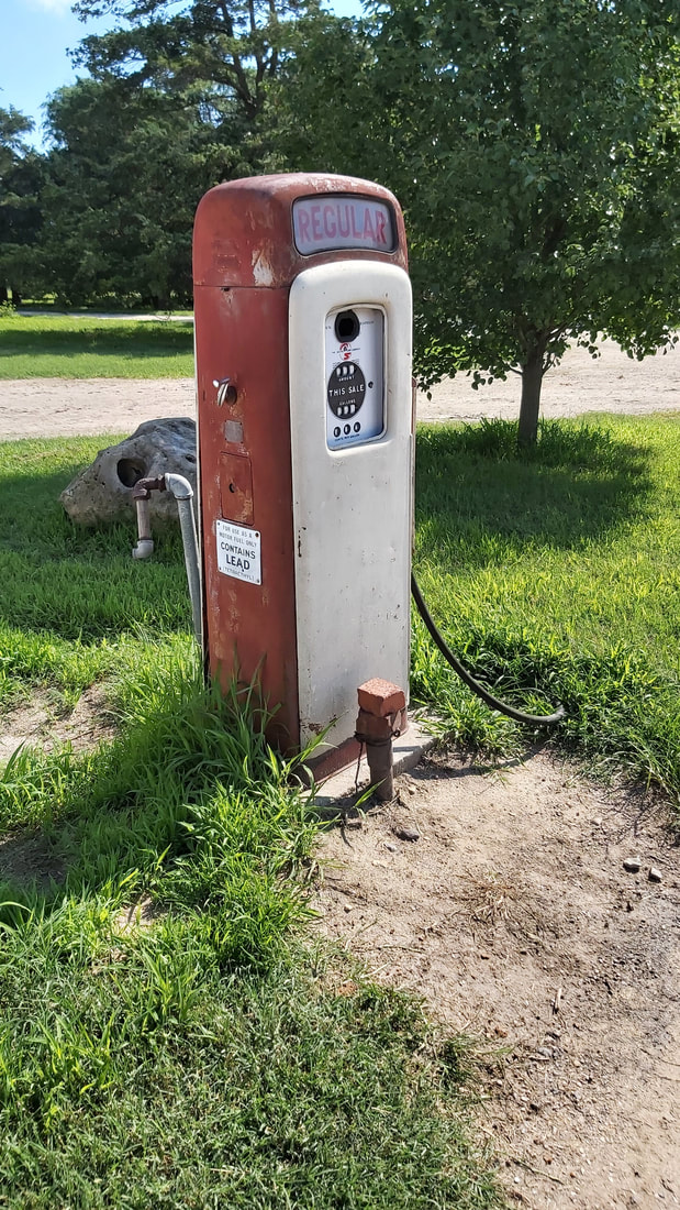A vintage fuel pump preserved at the farm